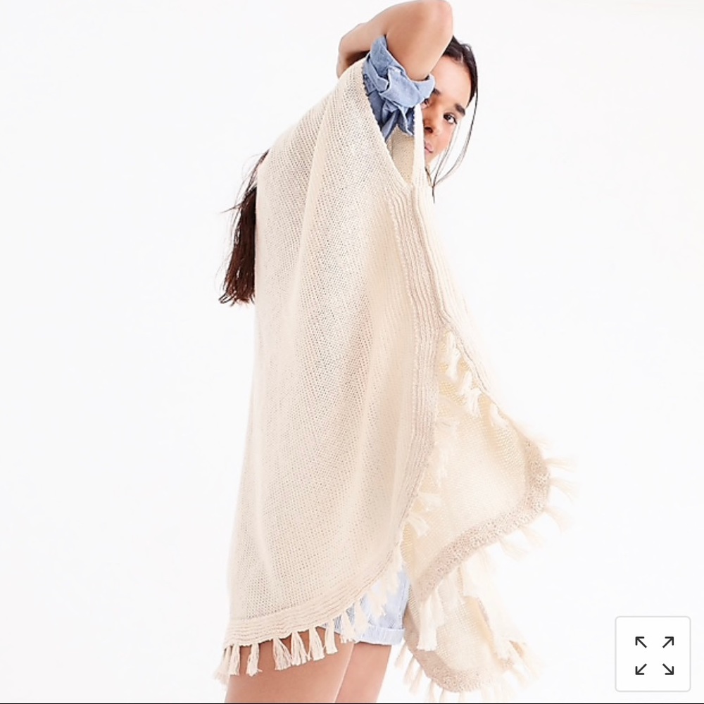 J CREW TASSELED LINEN PONCHO.  $130 NET A PORTER